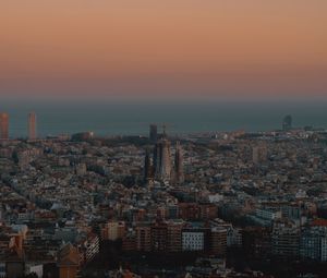 Preview wallpaper city, buildings, aerial view, cityscape, sea, twilight