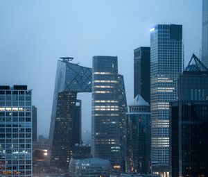 Preview wallpaper city, buildings, aerial view, road, lights, twilight