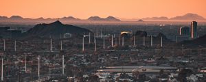 Preview wallpaper city, buildings, aerial view, cityscape, trees, twilight