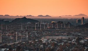 Preview wallpaper city, buildings, aerial view, cityscape, trees, twilight