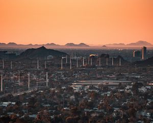 Preview wallpaper city, buildings, aerial view, cityscape, trees, twilight