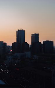Preview wallpaper city, buildings, aerial view, twilight