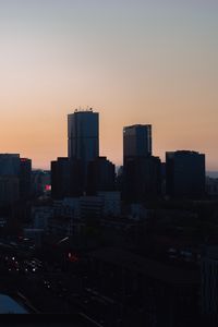 Preview wallpaper city, buildings, aerial view, twilight