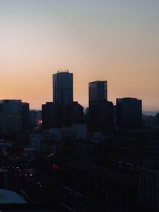 Preview wallpaper city, buildings, aerial view, twilight
