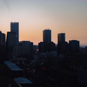 Preview wallpaper city, buildings, aerial view, twilight