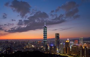 Preview wallpaper city, buildings, aerial view, lights, sunset