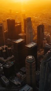 Preview wallpaper city, buildings, aerial view, sunset