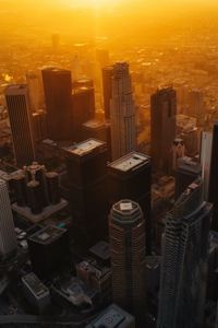 Preview wallpaper city, buildings, aerial view, sunset