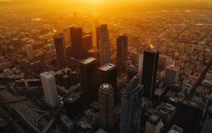 Preview wallpaper city, buildings, aerial view, sunset