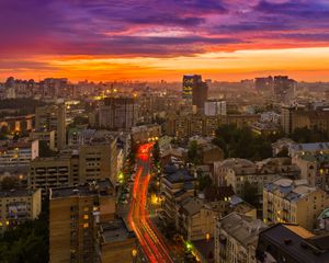 Preview wallpaper city, buildings, aerial view, road, sunset, purple