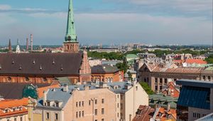 Preview wallpaper city, buildings, aerial view, roofs, architecture