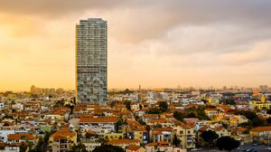 Preview wallpaper city, buildings, aerial view, roofs, cityscape