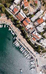 Preview wallpaper city, buildings, aerial view, pier, boats, water