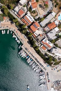 Preview wallpaper city, buildings, aerial view, pier, boats, water