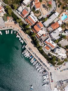 Preview wallpaper city, buildings, aerial view, pier, boats, water