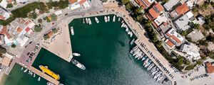 Preview wallpaper city, buildings, aerial view, pier, boats, water