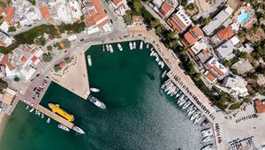 Preview wallpaper city, buildings, aerial view, pier, boats, water