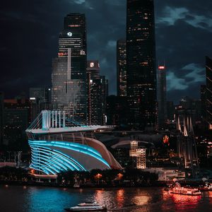 Preview wallpaper city, buildings, architecture, night, moon, light