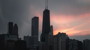 Preview wallpaper city, buildings, architecture, towers, sunset
