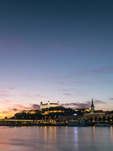 Preview wallpaper city, buildings, architecture, river, coast, night