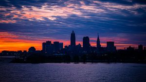 Preview wallpaper city, buildings, architecture, tower, water, sunset