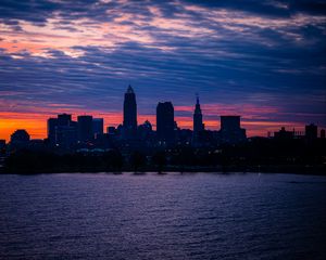 Preview wallpaper city, buildings, architecture, tower, water, sunset