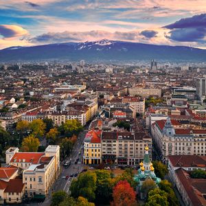 Preview wallpaper city, buildings, architecture, roofs, mountains