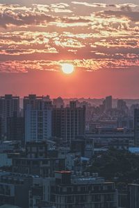 Preview wallpaper city, buildings, architecture, sunset, dusk