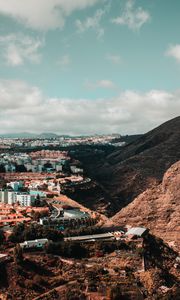 Preview wallpaper city, buildings, architecture, rocks, slope