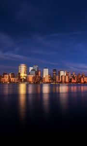 Preview wallpaper city, buildings, architecture, coast, reflection