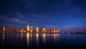 Preview wallpaper city, buildings, architecture, coast, reflection