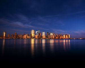Preview wallpaper city, buildings, architecture, coast, reflection