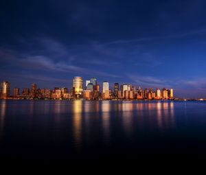 Preview wallpaper city, buildings, architecture, coast, reflection