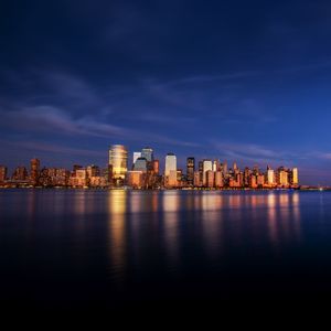 Preview wallpaper city, buildings, architecture, coast, reflection