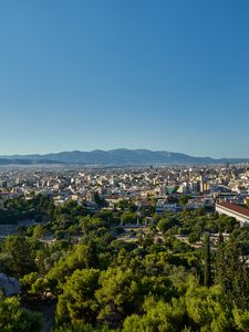 Preview wallpaper city, buildings, architecture, trees, mountains