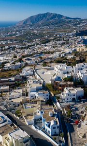 Preview wallpaper city, buildings, architecture, mountains, roofs