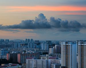 Preview wallpaper city, buildings, architecture, skyscraper, clouds, sunset