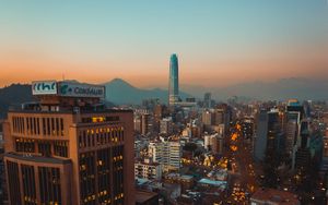 Preview wallpaper city, buildings, architecture, tower, road, lights