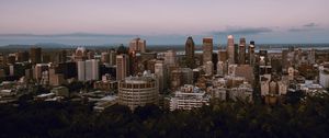 Preview wallpaper city, buildings, architecture, evening, sky