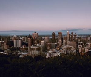 Preview wallpaper city, buildings, architecture, evening, sky
