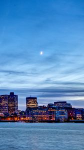 Preview wallpaper city, buildings, architecture, moon, sea