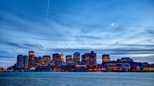 Preview wallpaper city, buildings, architecture, moon, sea