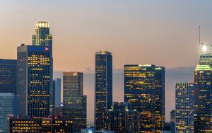 Preview wallpaper city, buildings, architecture, lights, dusk