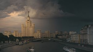 Preview wallpaper city, buildings, architecture, river, boats