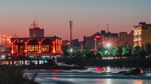 Preview wallpaper city, buildings, architecture, river, stones