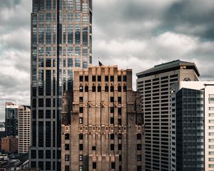 Preview wallpaper city, buildings, architecture, clouds