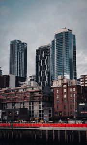 Preview wallpaper city, buildings, architecture, construction, clouds