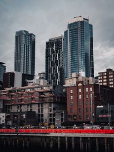 Preview wallpaper city, buildings, architecture, construction, clouds