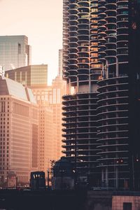 Preview wallpaper city, buildings, architecture, sunset
