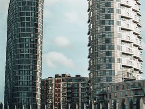 Preview wallpaper city, buildings, architecture, clouds, bottom view